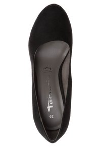 Chaussure plate ballerine noire pour femme avec bout rond, marquage visible sur la semelle intérieure et taille 35 indiquée à l'intérieur.