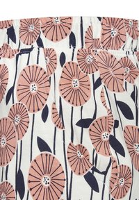 Floral top featuring large pink flowers with black outlines on a white background. Includes green leaves and a gathered waistband.