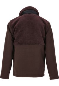 Brown fleece jacket featuring a textured upper section with a soft, plush finish. Structured collar and long sleeves with a smooth lower body.