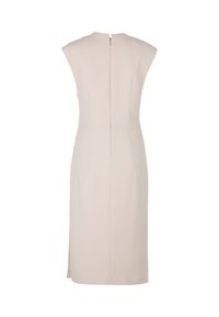 Mouwloze, figuurvormende jurk in licht beige, voorzien van een ritssluiting op de rug en een split aan de zijkant, met een gladde stof en nauwkeurige naden.