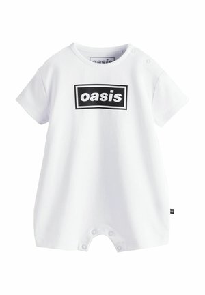 Biely dieťaťový overal s krátkym rukávom s čiernym ohraničeným textom "oasis" na prednej strane a patentkami na ramene a medzi nohami.