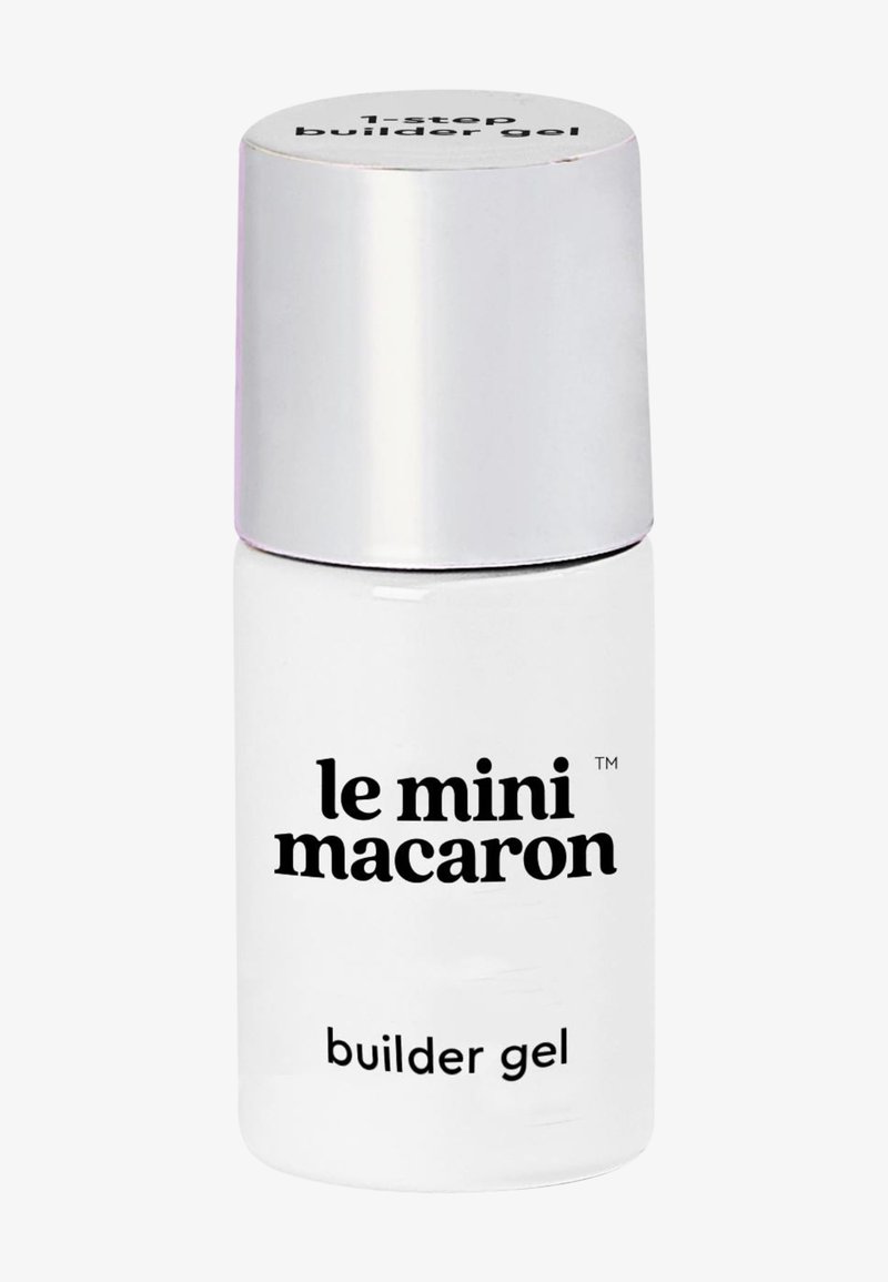 Small white bottle with silver cap labeled "le mini macaron builder gel" for nail enhancement.