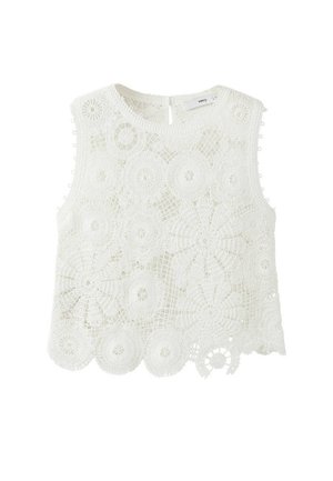 Crop top blanc en dentelle sans manches avec motifs floraux circulaires et ourlet festonné, avec une petite fermeture à bouton au dos.