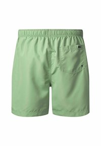 Bañador corto de color verde claro con cinturilla elástica y un único bolsillo trasero. Hecho de un material suave y ligero, con un diseño minimalista.