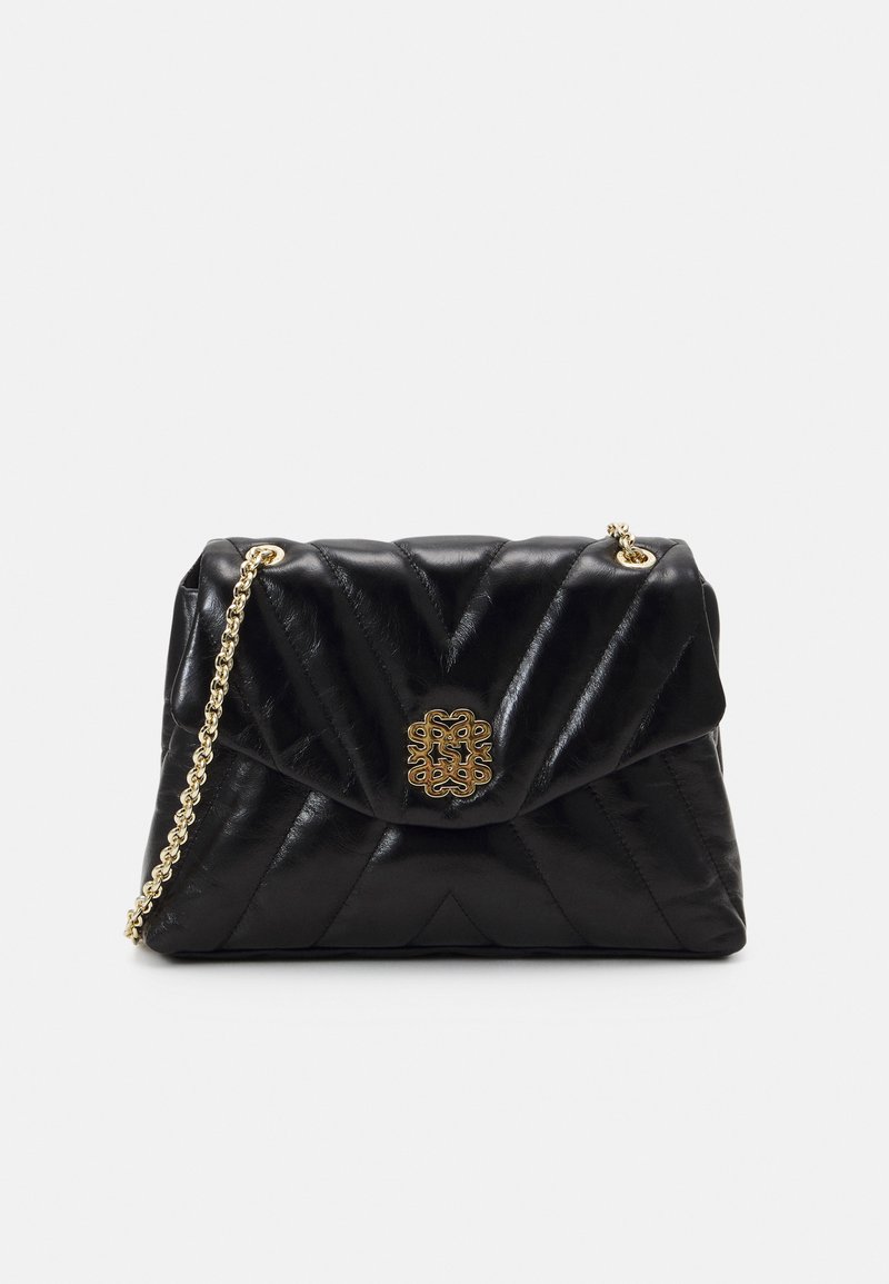 Black quilted leather handbag with gold-tone chain strap and ornate front clasp. Features chevron pattern and a soft, glossy texture.