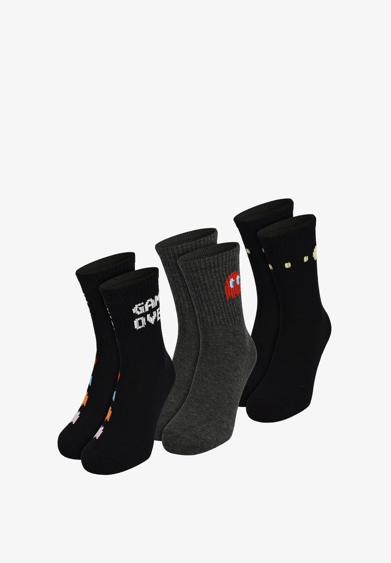 Three pairs of mid-calf socks with retro video game designs: black with "GAME OVER," gray with red ghost, and black with yellow dots.
