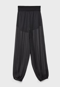 Schwarze, leichte Hose mit weitem, elastischem Bund und lockerem, transparentem Stoff. Mit gerafften Bündchen am Knöchel.