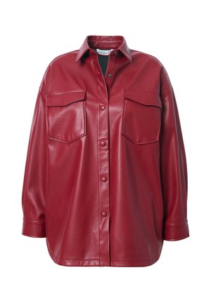 Red leather oversized shirt with a pointed collar, front button closure, and two chest pockets. Smooth texture and relaxed fit.