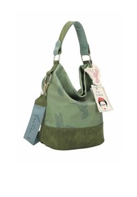 Sac hobo vert en matériaux suédé et toile, présentant des motifs de colibris, une étiquette détachable et une bandoulière plate.