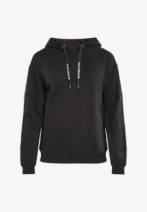 Črna kapuca s dolgimi rokavi. Ima rebraste manšete, ohlapen kroj in kontrastne vrvice z besedilom "Brez uličnega sloga".