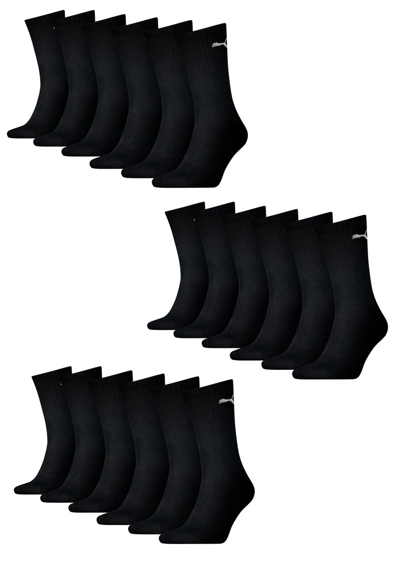 Schwarze Baumwollsocken, mit gerippter Textur, knöchellang, mit einem kleinen weißen Logo am Bund. Zwei Stapel mit acht Paaren enthalten.