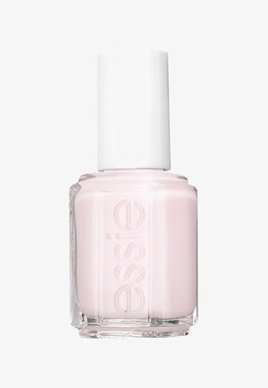 Bottiglia di smalto per unghie in vetro trasparente con un tappo bianco. Lo smalto all'interno è di una morbida tonalità rosa chiaro con una consistenza liscia.