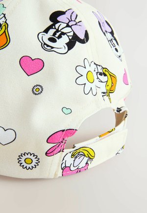 Casquette en coton avec un fond crème clair ornée de personnages et motifs de dessins animés colorés, y compris des cœurs, des fleurs et des designs ludiques.