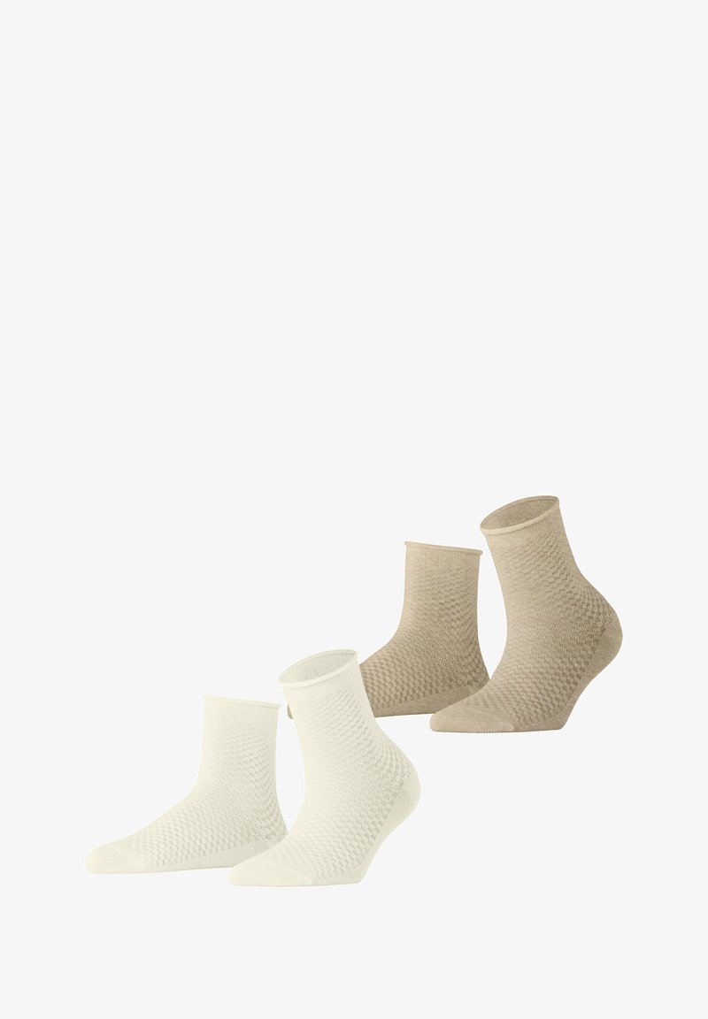 Set van vier enkelsokken in wit en beige. Geweven patroon over de hele sok, met een geribbelde rand. Gemaakt van een zachte, rekbare stof.