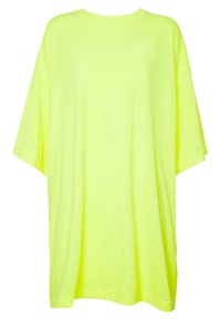 T-shirt oversize realizzato in tessuto morbido, di colore giallo neon brillante, scollo rotondo, maniche corte e senza motivi o decorazioni visibili.