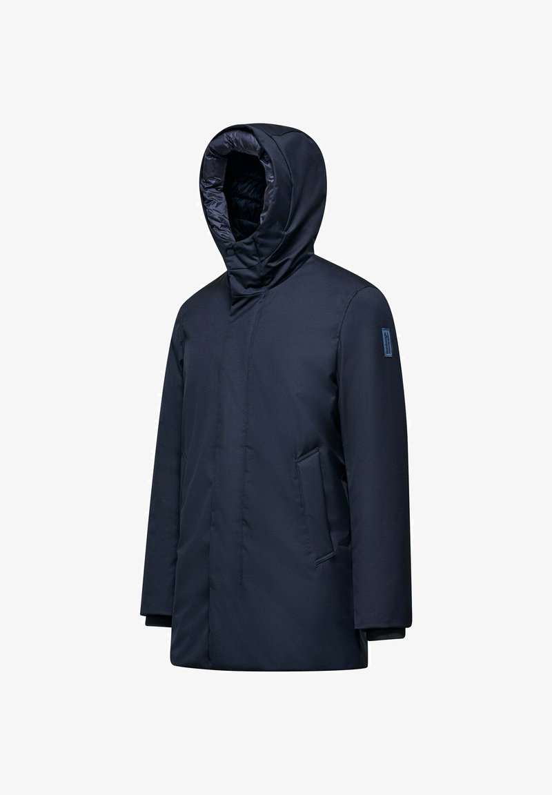 Navy blue parka with a hood, made of smooth, water-resistant fabric. Features a hidden front closure and side pockets, minimalistic design.