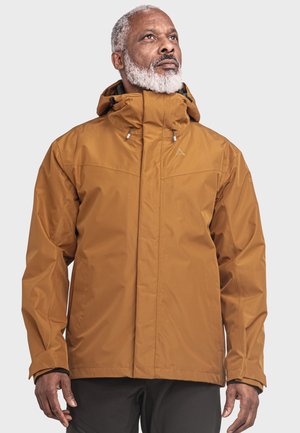 Braune wasserdichte Jacke mit hohem Kragen, Frontreißverschluss und verstellbare Kapuze. Sie hat ein schlichtes Design und einen strukturierten Stoff.
