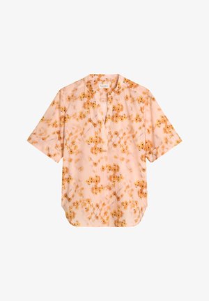 Blouse rose clair à manches courtes, coupe ample, col mandarin et motif floral orange.