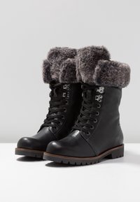 Caprice Botines con cordones - black