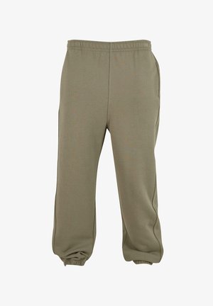 Pantalons de survêtement vert olive avec une taille élastique, des poches latérales et des poignets resserrés aux chevilles, fabriqués en tissu doux et extensible.