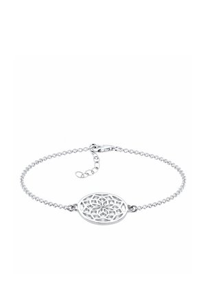 Bracelet chaîne en argent avec pendant ovale présentant un motif floral symétrique découpé et une fermeture ajustable à fermoir homard.