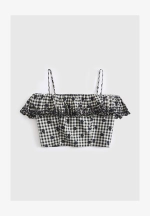 Zwart-wit geruit crop top met dunne bandjes, off-shoulder ruches en zwarte bloemenborduursel langs de rand van de ruches.