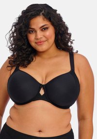 Černá podprsenka s hladkými, polstrovanými košíčky, nastavitelnými ramínky a detailem klíčové dírky uprostřed. Materiál má měkkou texturu a jednobarevný design.
