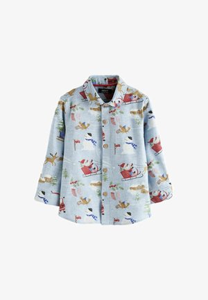 Light blue long-sleeve shirt featuring festive patterns of snowmen, reindeer, and sledding scenes; button-down front and soft texture.