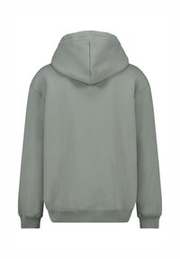 Sweatshirt à capuche en tissu doux et vert clair. Doté d'une coupe décontractée, de poignets côtelés et d'un dos lisse et simple sans embellissements.