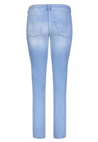 Jeans in denim blu chiaro con un design aderente, stile a cinque tasche e una leggera sfumatura. Dettagli di cucitura in vita e nei bordi.