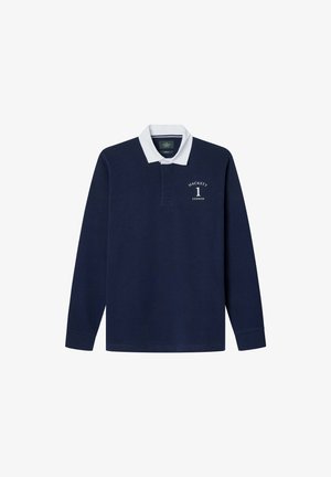 Tamno plavi dukserica s dugim rukavima s bijelim ovratnikom, s logotipom na prsima. Izrađena je od teksturirane tkanine s klasičnim krojem.