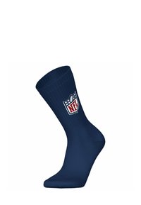 Calcetines de canalé azul marino con un logotipo de la NFL en blanco y un emblema de fútbol. Cuentan con refuerzo en el talón y la punta para mayor durabilidad.