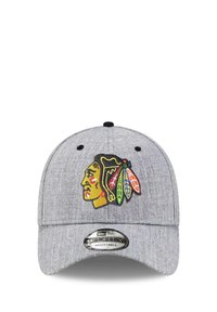 Gray adjustable cap with a rounded bill, featuring an embroidered colorful logo of a Native American profile with feathers. Smooth texture.