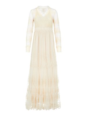 Długa, kremowa sukienka z przezroczystymi długimi rękawami, koronkowymi detalami, dekoltem w kształcie litery V i falbanistą spódnicą. Posiada misternie haftowane wzory w całym kroju.