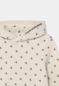 Calvin Klein Jeans Jersey con capucha - beige