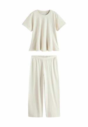 Weiches cremefarbenes, geripptes Kurzarmoberteil mit rundem Ausschnitt und passenden weiten Hosen mit elastischem Bund.