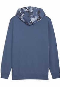 Blå hættebluse med et mønstret mørkegrå og lyseblå hætte. Lange ærmer, blødt stof, ribbede manchetter og kant.