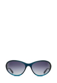 Une paire de lunettes de soleil teal avec des montures ovales surdimensionnées, dotées de verres dégradés qui passent d'un gris foncé à un clair.