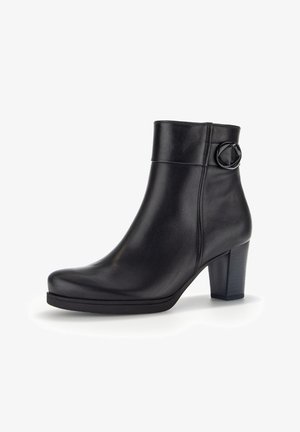 Black leather ankle boot with a chunky heel, rounded toe, and decorative side accent. Smooth texture, sleek design.
