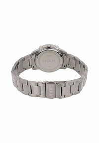 Silberne Edelstahl-Joop! Armbanduhr mit Metallband, Verschluss mit eingraviertem Markennamen und Gehäuseboden, der die Modellangaben zeigt.