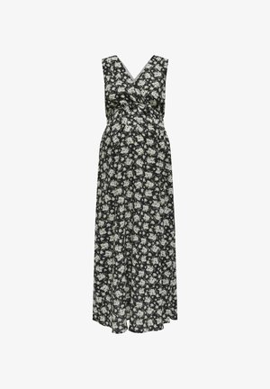 Vestido maxi floral con fondo negro, con flores blancas y verdes, escote en V, diseño envolvente y silueta fluida.