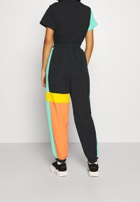 Ellesse Pantalones deportivos - black