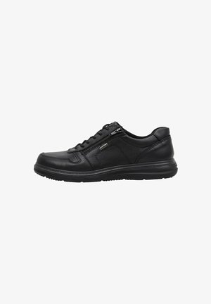 Black leather sneaker with a smooth finish, rounded toe, flat rubber sole, lace-up design, and a side zipper for easy access.