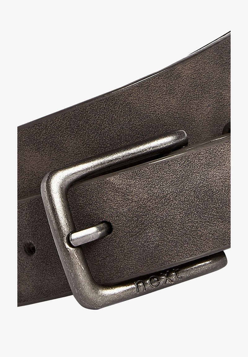 Brown leather belt with a textured finish and a polished metal buckle engraved with "next." Features a classic design and sturdy hardware.
