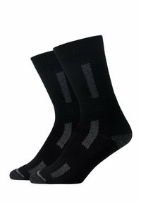 Calze nere con bordo a costine, tallone e punta rinforzati, e accenti grigi con un motivo testurizzato e strisce verticali.