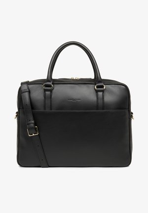 Black leather handbag with dual top handles and an adjustable shoulder strap. Features a front pocket and goldtone hardware accents.