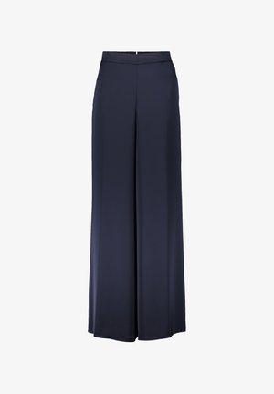 Granatowe spodnie w stylu szerokich nogawek wykonane z gładkiego materiału, z wysokim stanem i prostymi liniami, z prostym zapięciem z przodu i bez kieszeni.