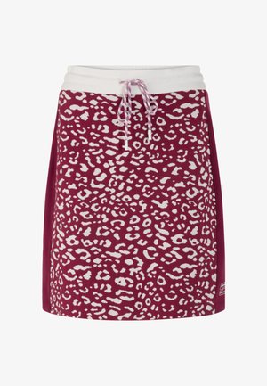 Lila Rock mit weißem Leopardenmuster, elastischem Bund, Kordelzugverschluss und seitlichen Akzenten in einer einfarbigen Farbe.