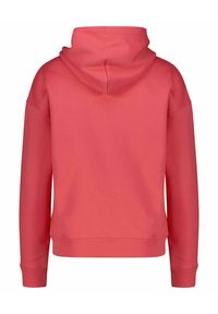 Felpa corallo con cappuccio, polsini e orlo a costine, e una consistenza morbida. Il design è sulla parte posteriore, con una silhouette semplice e pulita.