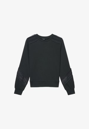 Felpa nera a maniche lunghe con pannelli decorativi in pizzo su spalle e maniche, polsini a coste e scollo rotondo.